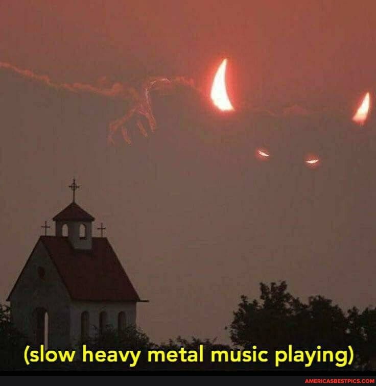 (slow heavy metal music playing)