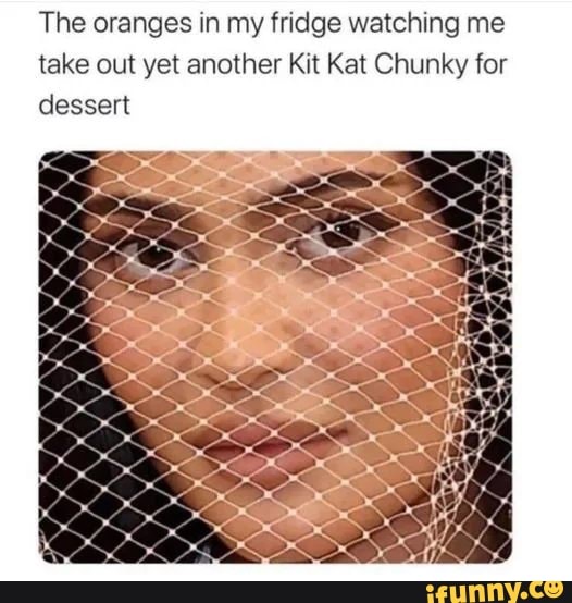 The oranges in my fridge watching me take out yet another Kit Kat