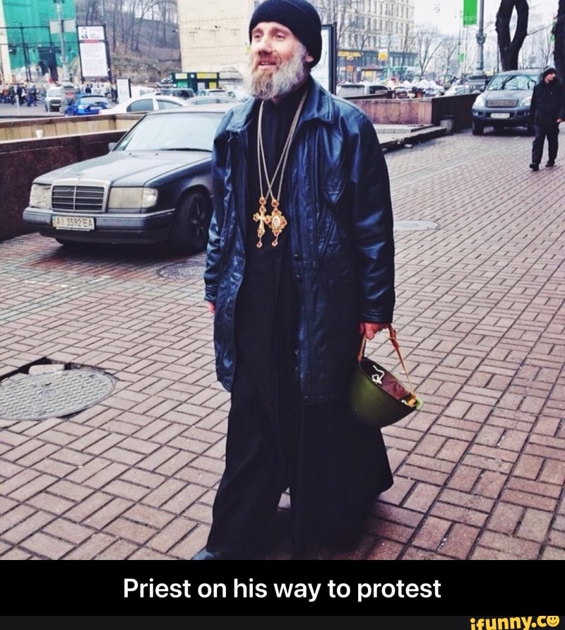 Priest on his way to protest - Priest on his way to protest