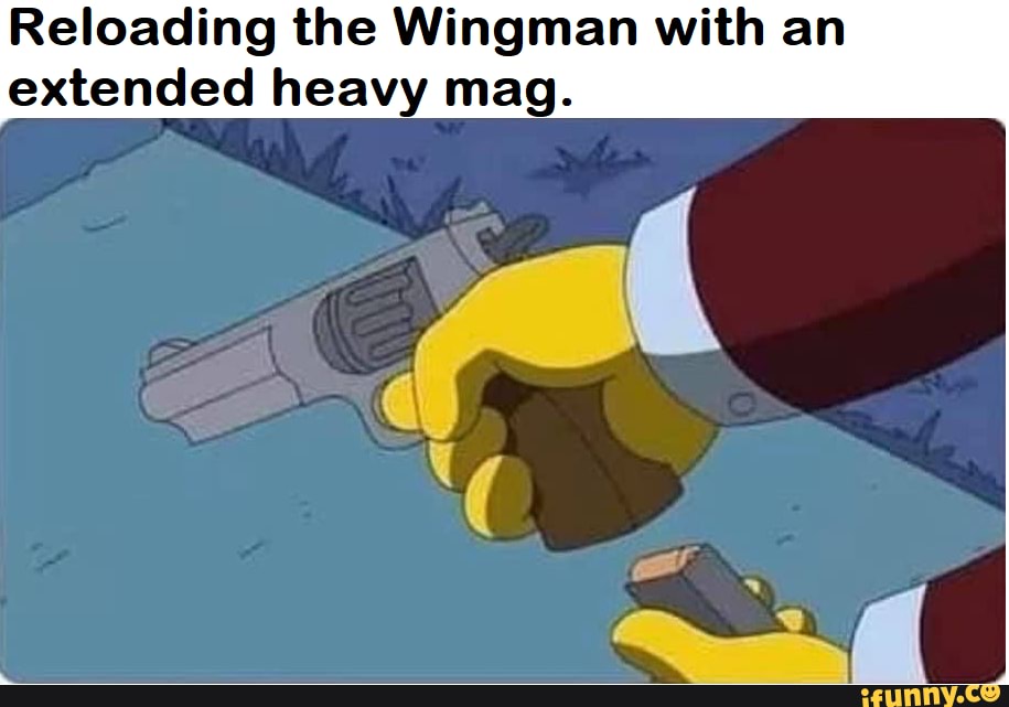Reloading the Wingman with an extended heavy mag.