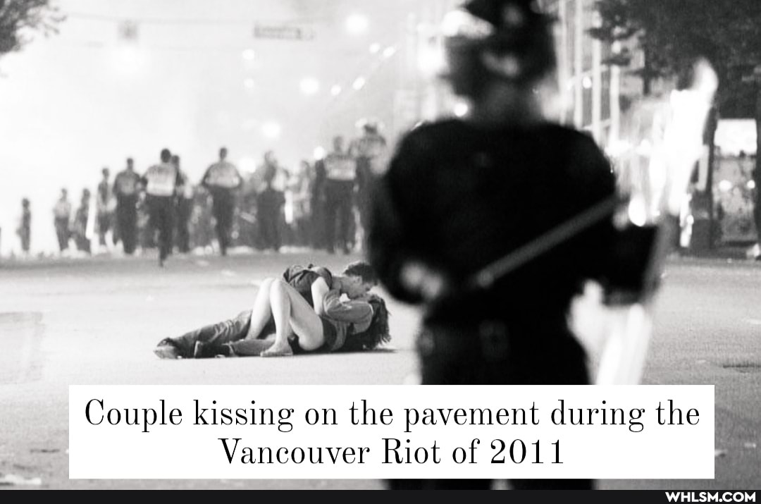Couple kissing on the pavement during the
Vancouver Riot of 2011