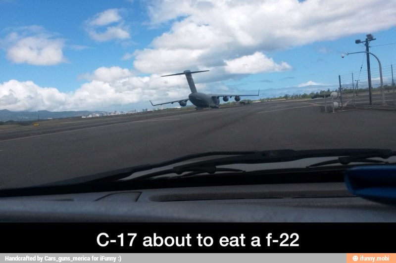 C-17 about to eat a f-22 - C-17 about to eat a f-22