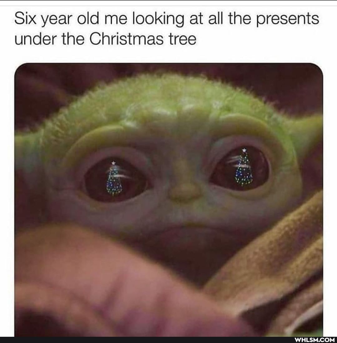 Six year old me looking at all the presents under the Christmas tree