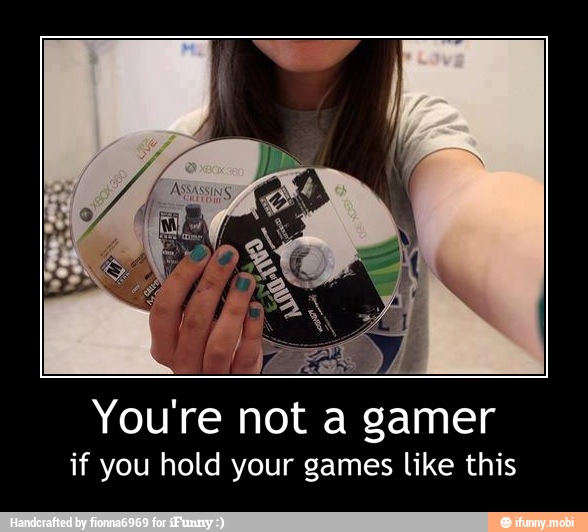 You're not a
'gamer
if you hold your games like this - You're not a gamer
if you hold your games like this