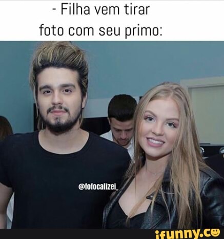 Filha vem tirar
foto com seu primo: