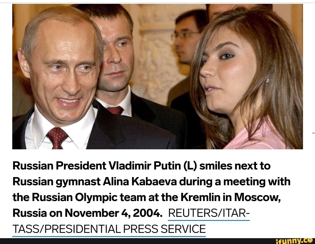 Russian President Viadimir Putin (L) Smiles Next To Russian Gymnast ...