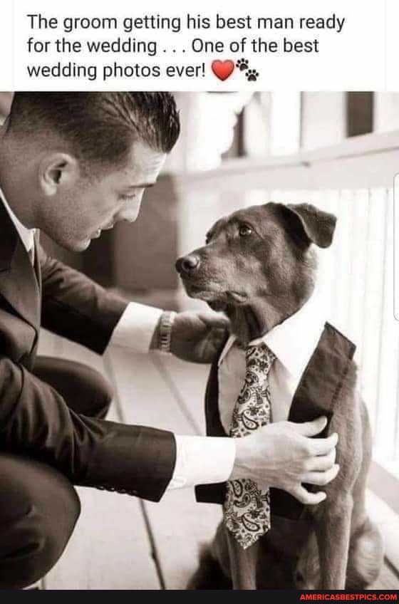 The groom getting his best man ready for the wedding . . . One of the best wedding photos ever!