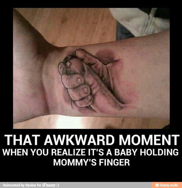 That awkward moment when you realize IT'S a baby holding mommy's finger...