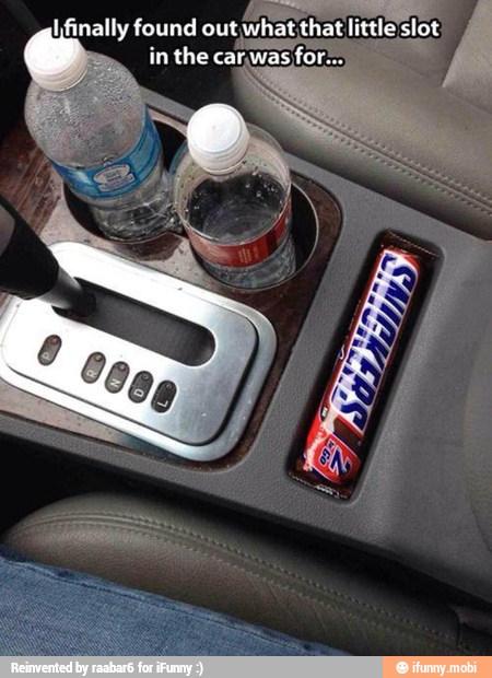 E L finally found out whatthat little' slot
in the carwas