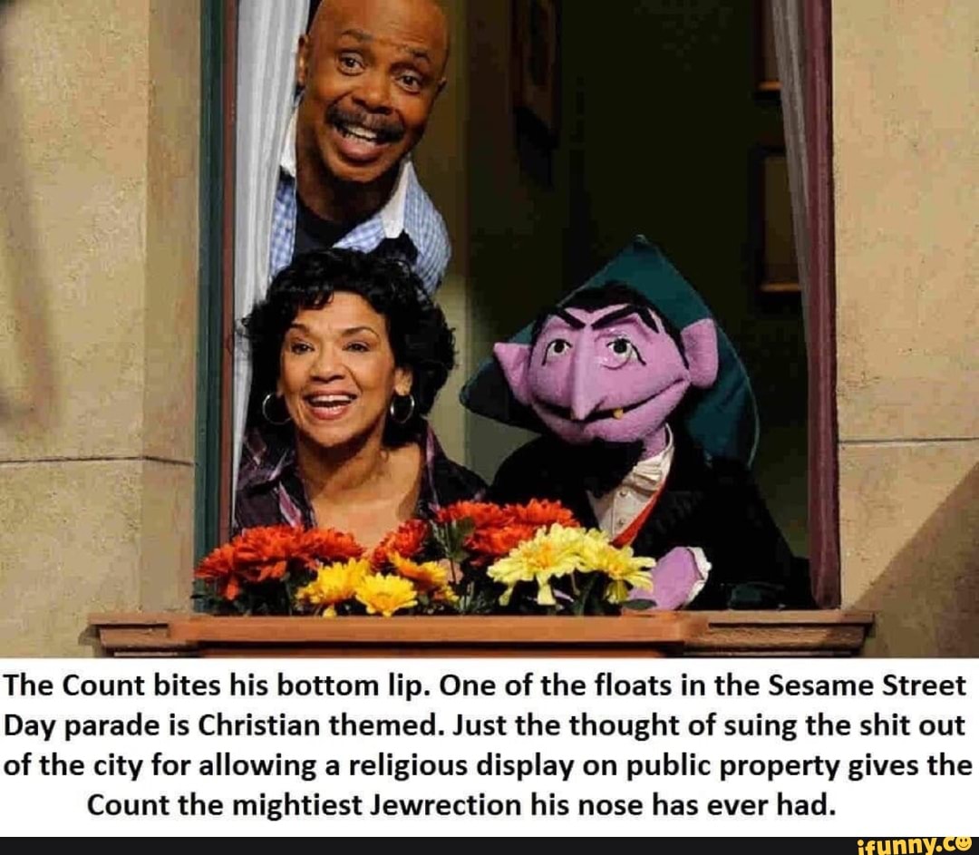 The Count bites his bottom lip. One of the floats in the Sesame Street ...
