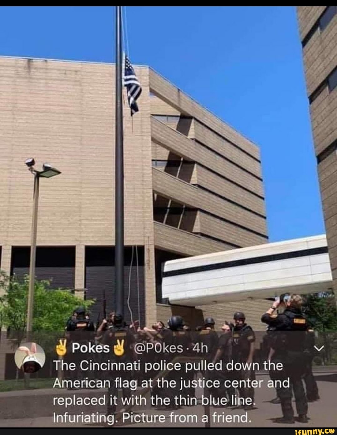 as Y Pokes
The Cincinnati police pulled down
t
the
American flag_at the justice center and. I
um
à
replaced it with the thi lue lihe À
