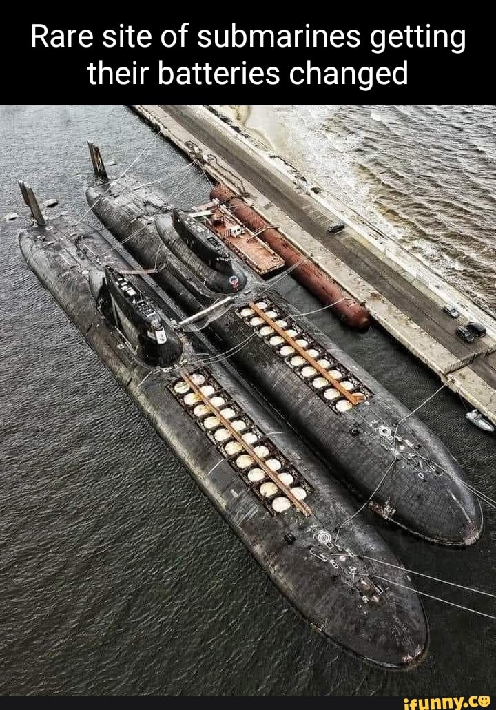 Rare site of submarines getting their batteries changed - )
