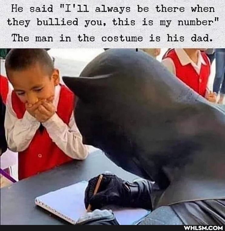 He said "I'll always be there when they bullied you, this is my number"
The man in the costume is his dad.