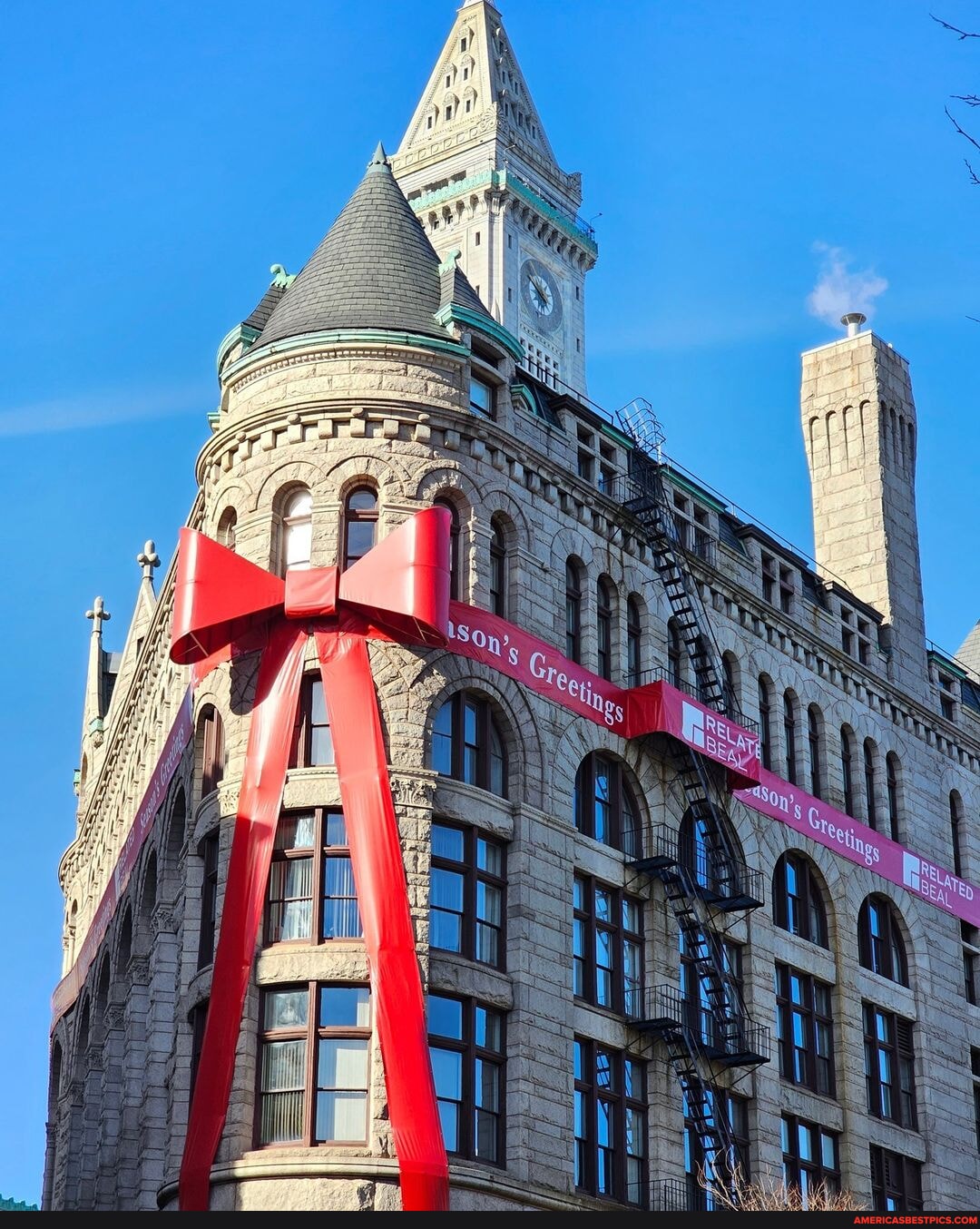 A giant red bow adorns the sevenstory Flour and Grain Exchange