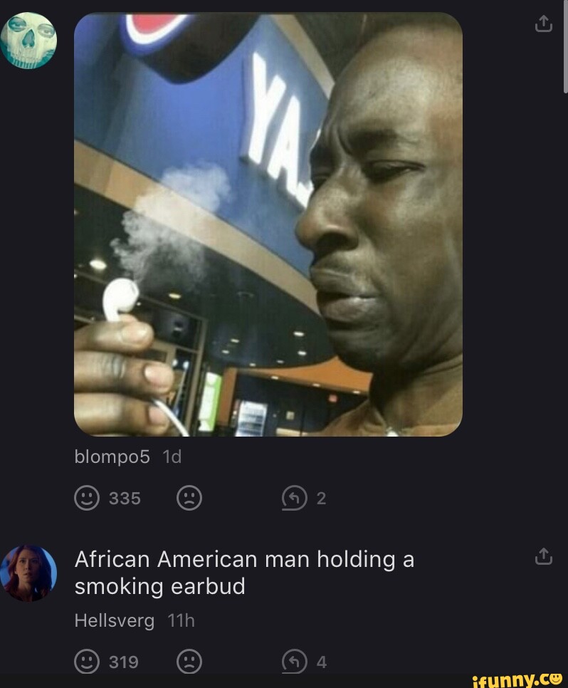 Blompo5 33 African American man holding a smoking earbud Hellsverg