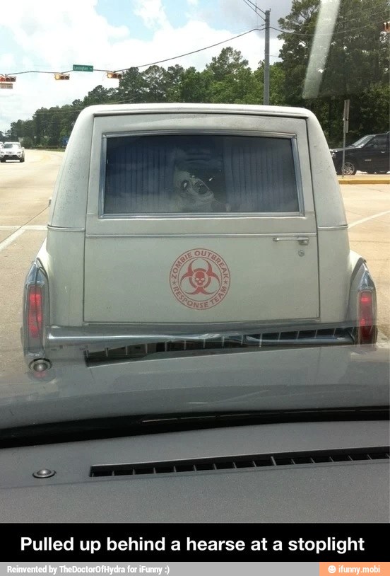 Pulled up behind a hearse at a stoplight