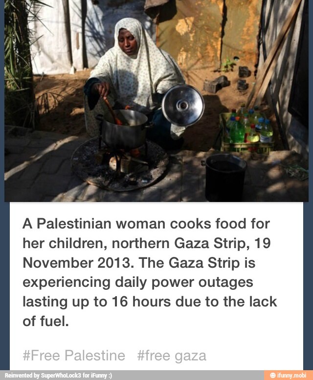A Palestinian woman cooks food for
her children, northern Gaza Strip, 19
November 2013. The Gaza Strip is
experiencing daily power outages
lasting up to 16 hours due to the lack
of fuel.