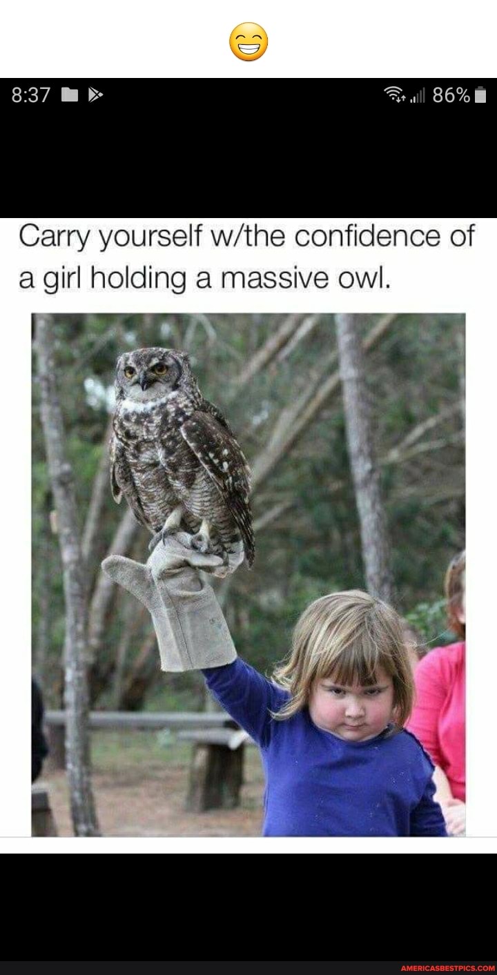 Carry yourself confidence of a girl holding a massive owl.