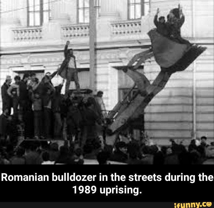 Komanlan nuuaozer m me Streets aurmg me
1989 uprising. - Romanian bulldozer in the streets during the 1989 uprising.