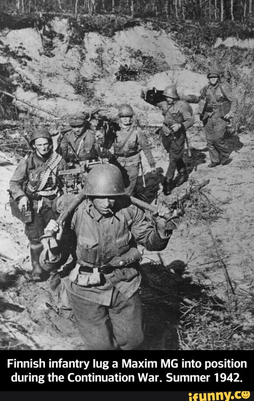 Finnish infantry lug a Maxim MG into posi on
during the Continuation War. Summer 1942. - Finnish infantry lug a Maxim MG into position during the Continuation War. Summer 1942.