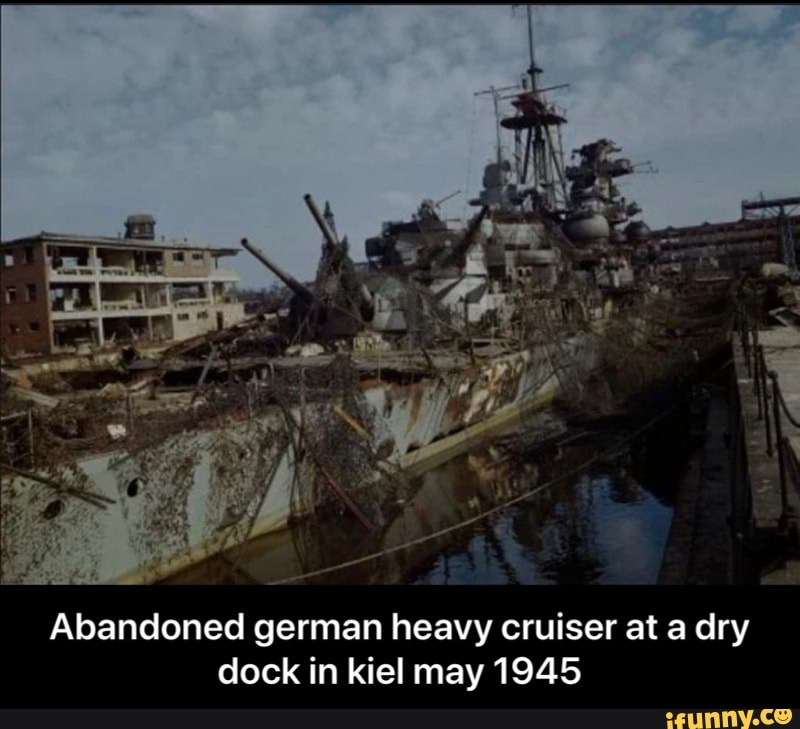 Abandoned german heavy cruiser at a dry
dock in kiel may 1945 - Abandoned german heavy cruiser at a dry dock in kiel may 1945