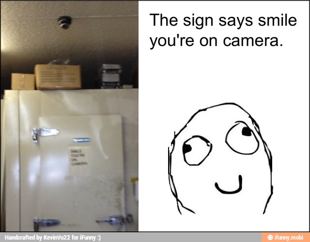 The sign says smile
you're on camera.