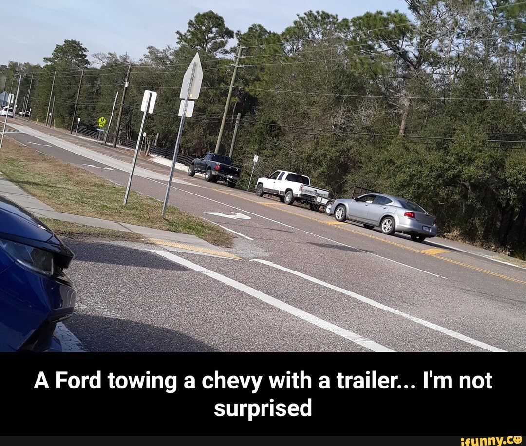 A Ford towing a chevy with a trailer... I'm not surprised - A Ford towing a chevy with a trailer... I'm not surprised
