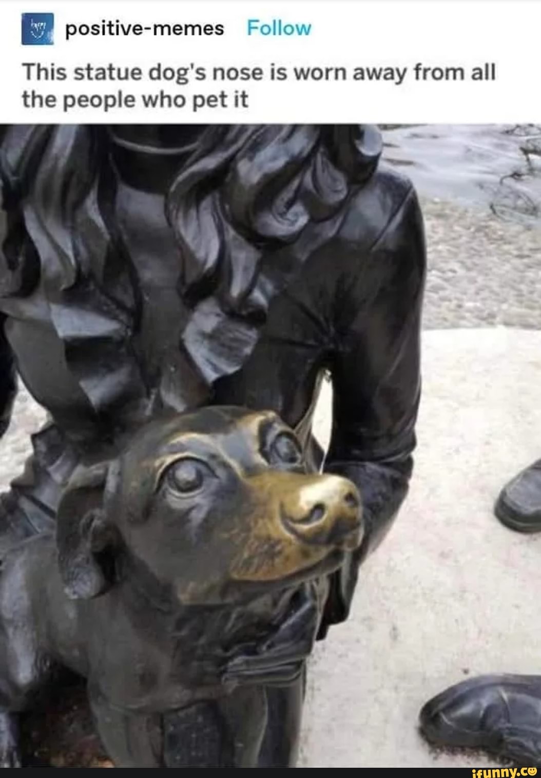This statue dog's nose is worn away from all the people who pet it