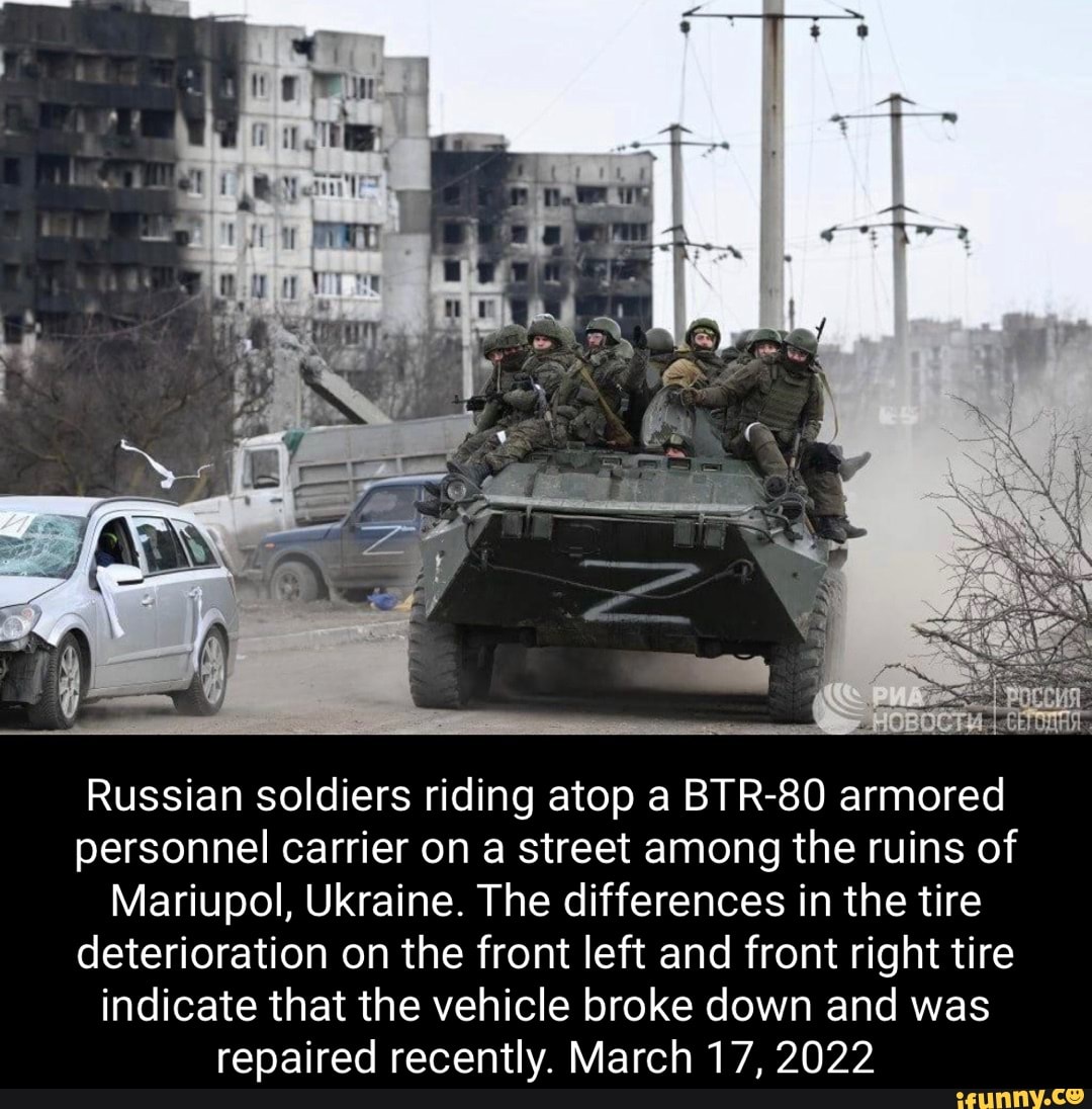 Russian Soldiers Riding Atop A BTR-80 Armored Personnel Carrier On A ...