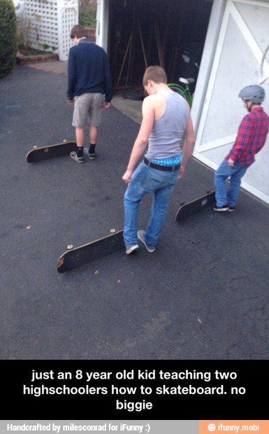 just an 8 year old kid teaching two
highschoolers how to skateboard. no
biggie - just an 8 year old kid teaching two highschoolers how to skateboard. no biggie