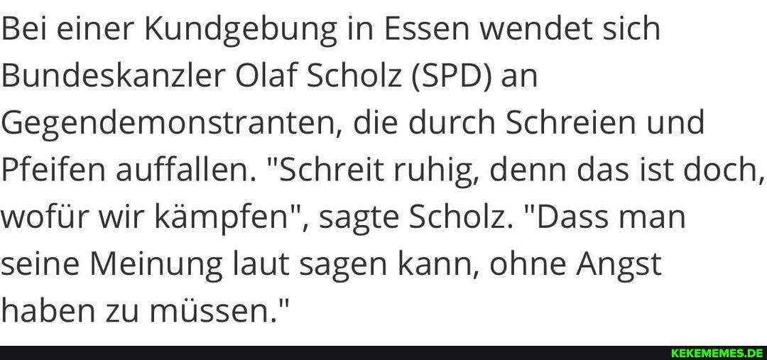 Bei einer Kundgebung in Essen wendet sich Bundeskanzler Olaf Scholz (SPD) an Geg