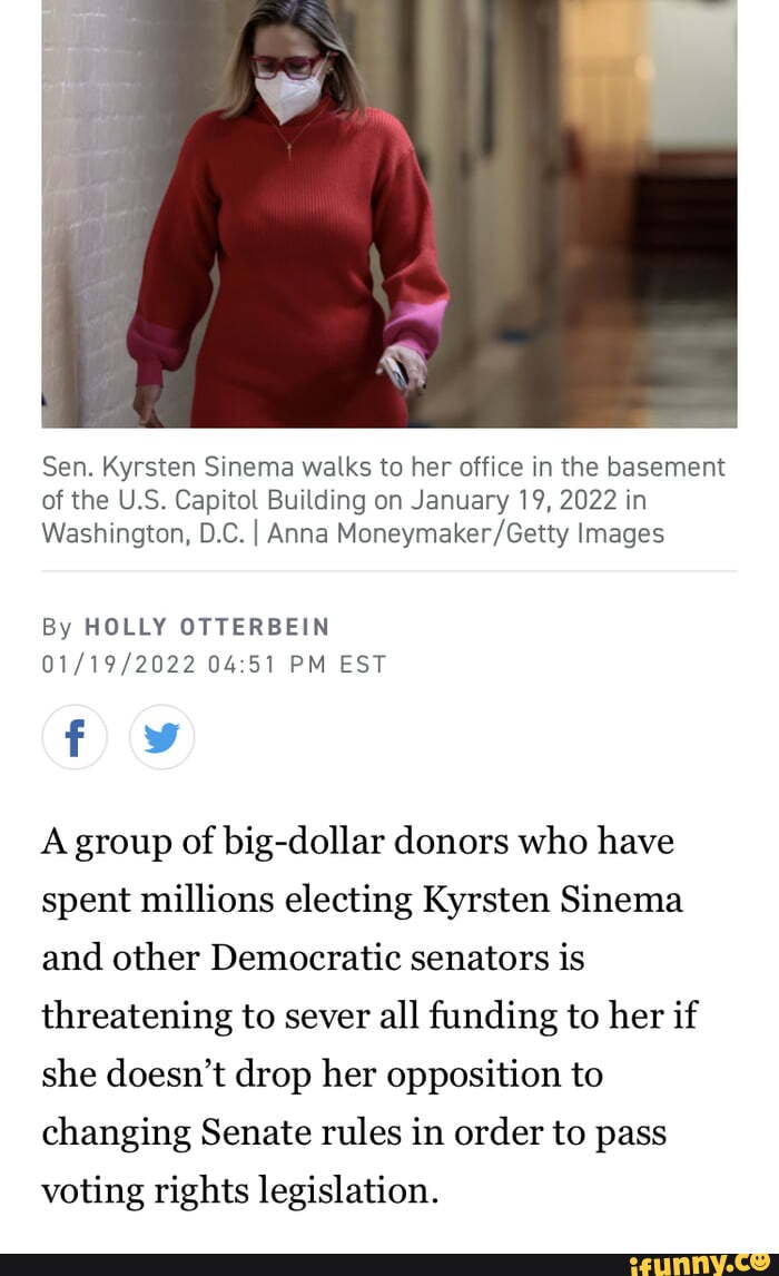 Sen. Kyrsten Sinema Walks To Her Office In The Basement Of The U.S ...