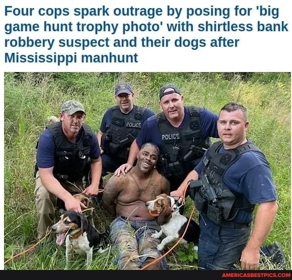 Four cops spark outrage by posing for 'big game hunt trophy photo' with shirtless bank robbery suspect and their dogs after
Mississippi manhunt