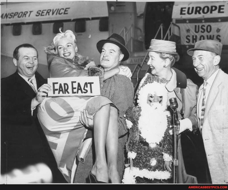 Actress Jayne Mansfield is carried by Bob Hope as they depart for a U.S ...