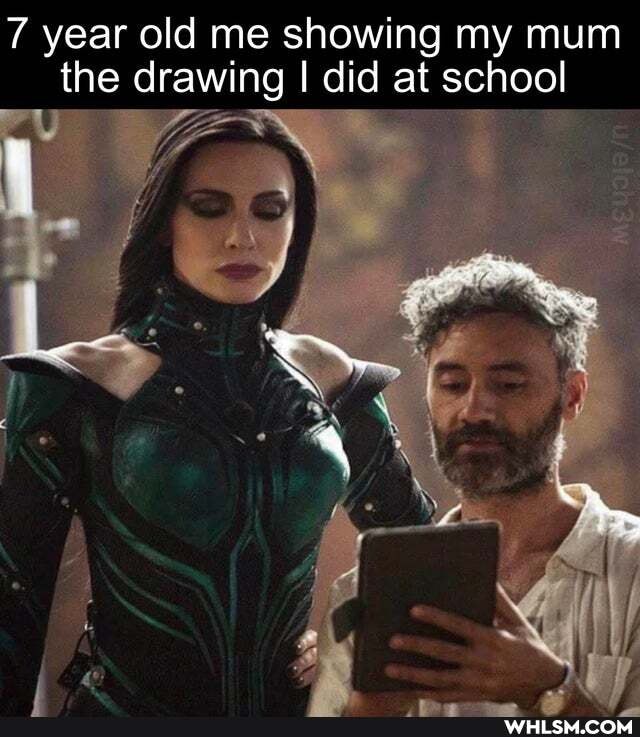 year old me showing my mum the drawing I did at school
