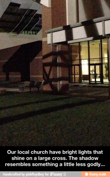 Our local church have bright lights that
shine on a large cross. The shadow
resembles something a little less godly... - Our local church have bright lights that shine on a large cross. The shadow resembles something a little less godly...