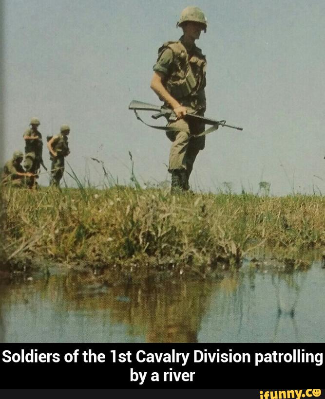 Soldiers of the 1st
Cavalry Division patrolling
by a river - Soldiers of the 1st Cavalry Division patrolling by a river