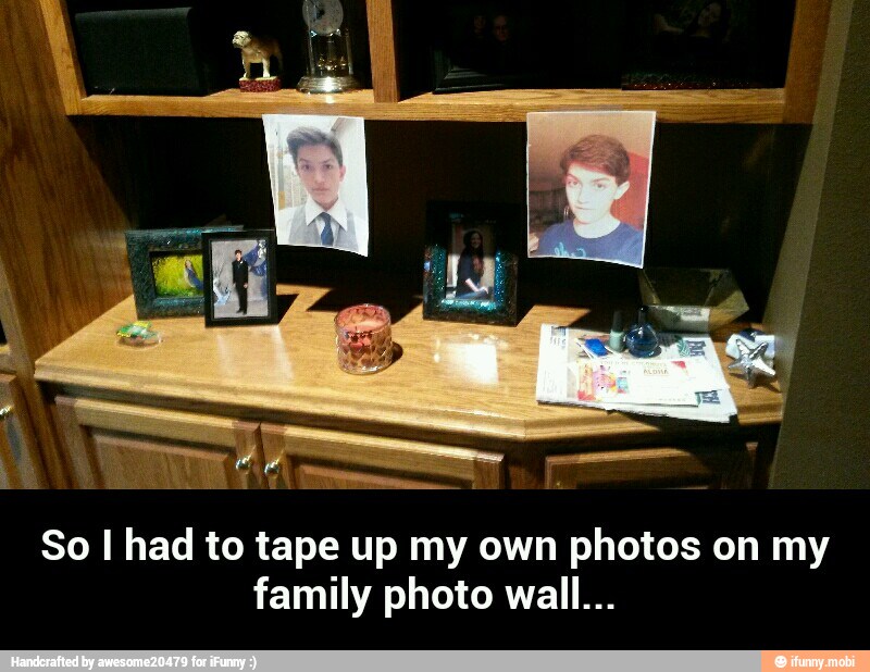 So I had to tape up my own photos on my
family photo wall... - So I had to tape up my own photos on my family photo wall...