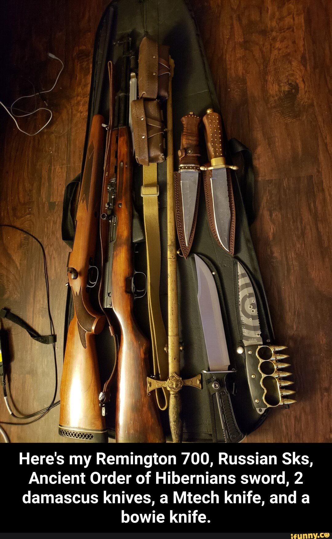 Here's my Remington 700, Russian Sks,
Ancient Order of Hibernians sword, 2 damascus knives, a Mtech knife, and a bowie knife. - Here's my Remington 700, Russian Sks, Ancient Order of Hibernians sword, 2 damascus knives, a Mtech knife, and a bowie knife.