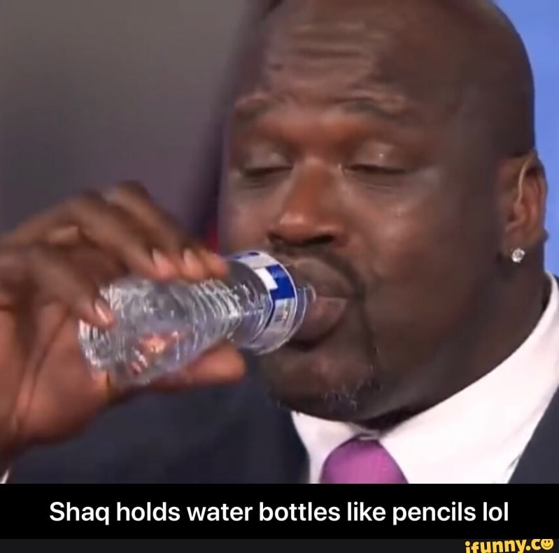 Shaq holds water bottles like pencils lol Shaq holds water bottles
