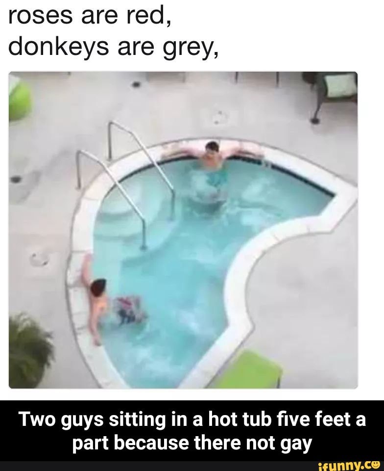 Two Guys Sitting In A Hot Tub Five Feet A Part Because There