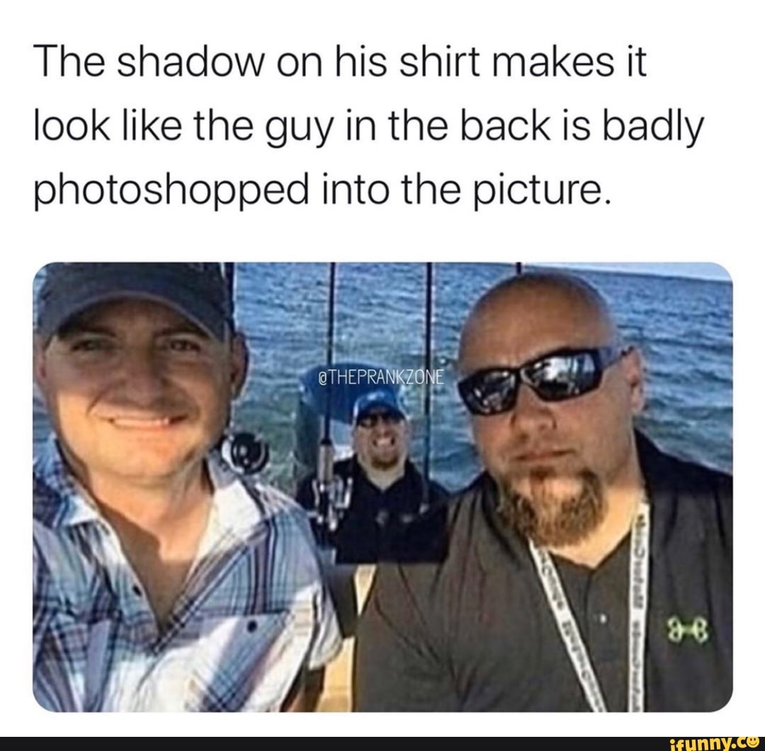 The shadow on his shirt makes it look like the guy in the back is badly ...